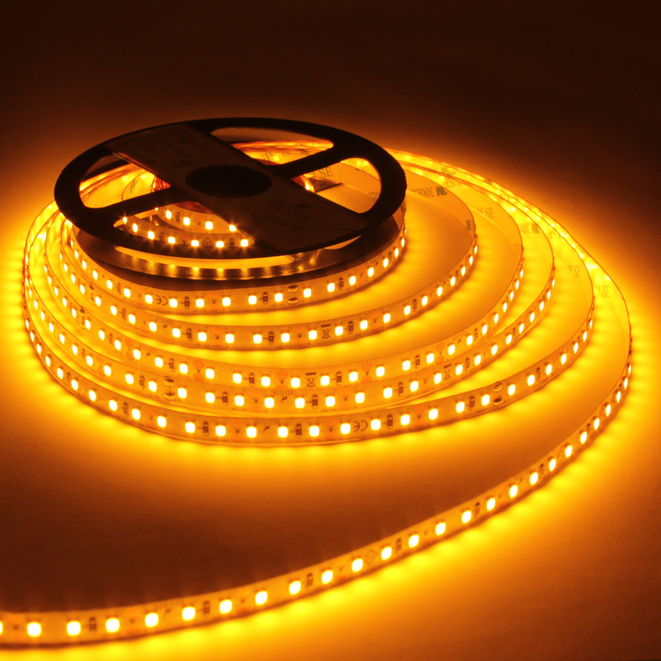 Світлодіодна стрічка LED-STIL 2400К 9,6 Вт/м 2835 120 діодів IP33 12V 750 lm БУРШТИНОВЕ світло