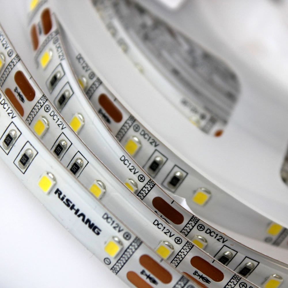 Світлодіодна стрічка RISHANG 4000K, 12 Вт/м, 2835, 60 діодів, IP65, 12V, 950 lm, нейтральне світло
